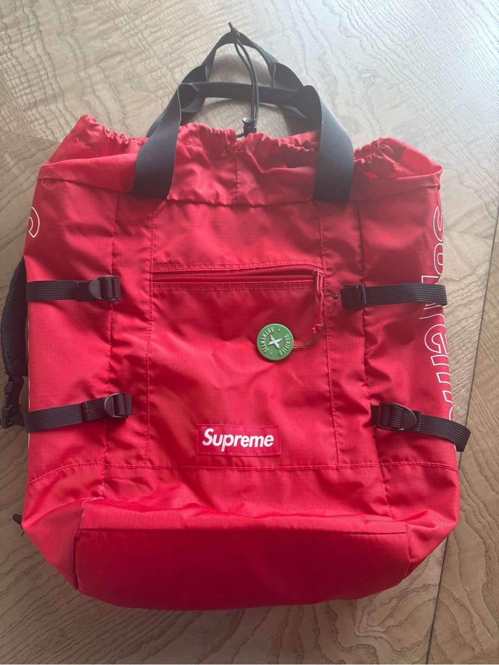 Supreme Red Tote Backpack with Black Straps and Green Pin